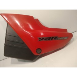 Tapa lateral izquierda asiento Yamaha YBR125